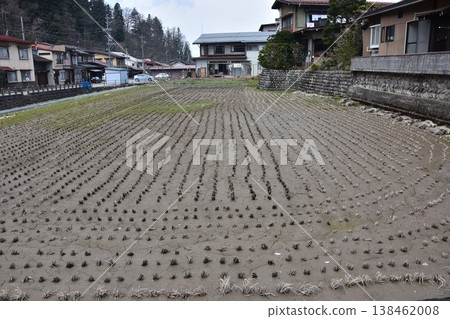 A scene from Takayama City, Gifu Prefecture, Japan, showing houses and rice paddies during the spring Takayama Festival. A scene from Takayama City, Gifu Prefecture, Japan, showing houses and rice paddies during the spring Takayama Festival. 138462008