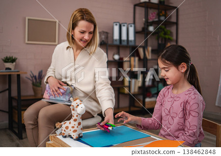 Child meeting pedagogue for school enrollment drawing activity Child meeting pedagogue for school enrollment drawing activity 138462848