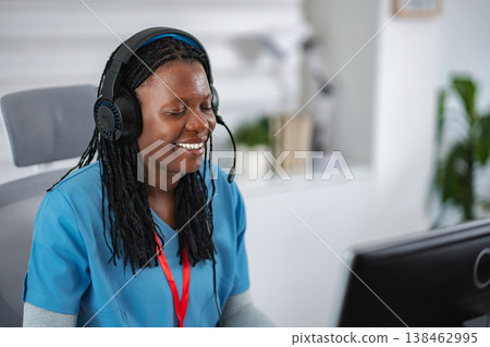 Healthcare professional working remotely providing telehealth support service 138462995