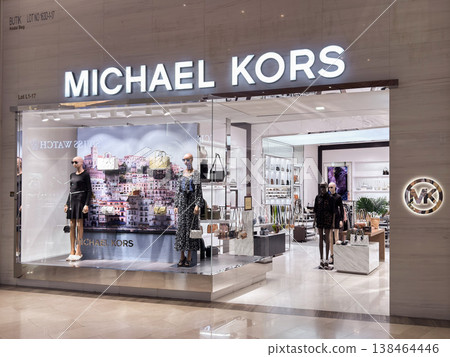 Stylish michael kors storefront showcases elegant fashion accessories in penang mall, malaysia Stylish michael kors storefront showcases elegant fashion accessories in penang mall, malaysia 138464446