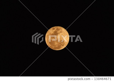 bright yellow full moon floating on sky in night background bright yellow full moon floating on sky in night background 138464671
