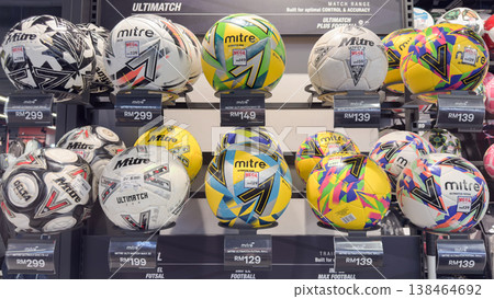 Colorful display of mitre footballs in a sports store in Penang, Malaysia Colorful display of mitre footballs in a sports store in Penang, Malaysia 138464692