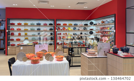 Colorful cookware display in Penang store featuring various kitchen items 138464702