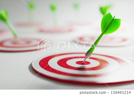 An arrow hits the bullseye showcasing business strategy, goals, objectives and achieving targets with precision and accuracy. 138465214
