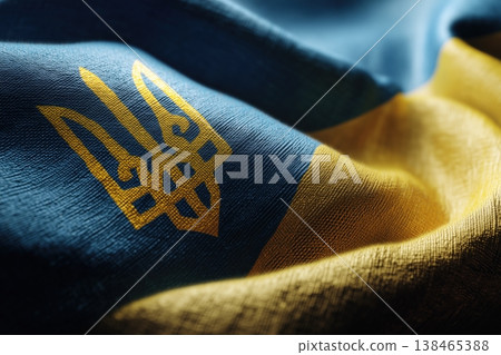Ukrainian flag featuring Tryzub emblem ripples in detailed fabric texture, showcasing patriotic colors and national symbol of Ukraine. 138465388