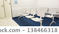 Empty white chairs in a waiting room at a clinic or government agency. Concept of medicine and comfort in service. 138466318