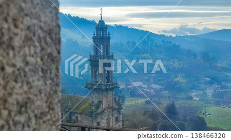 An ancient chapel in the morning haze in northern Spain. Concepts of tourism, religious tourism, the Camino de Santiago, pilgrims, and travel An ancient chapel in the morning haze in northern Spain. Concepts of tourism, religious tourism, the Camino de Santiago, pilgrims, and travel 138466320