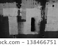Black and white horizontal photograph of a dirty concrete wall with splash background material. 138466751