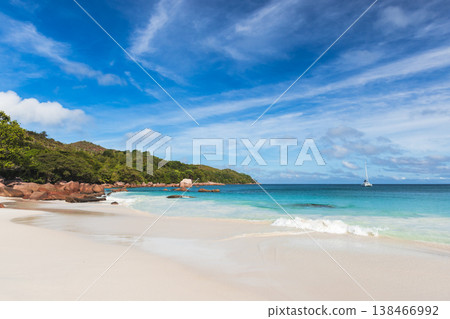 A tranquil tropical beach with powder-white sand A tranquil tropical beach with powder-white sand 138466992