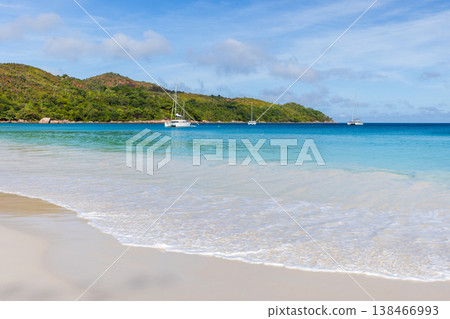A tranquil tropical beach with soft white sand, Seychelles 138466993