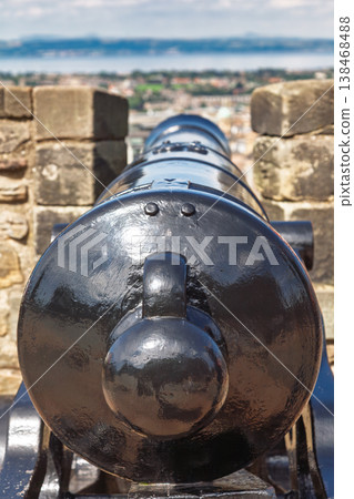 Historic defensive cannon on castle fortification 138468488