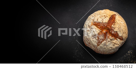 Bread loaf on dark background with copy space Bread loaf on dark background with copy space 138468512
