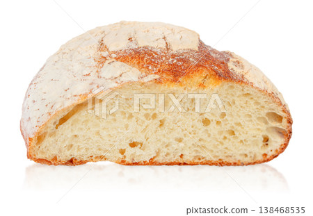 Half artisan sourdough bread loaf isolated on light background Half artisan sourdough bread loaf isolated on light background 138468535