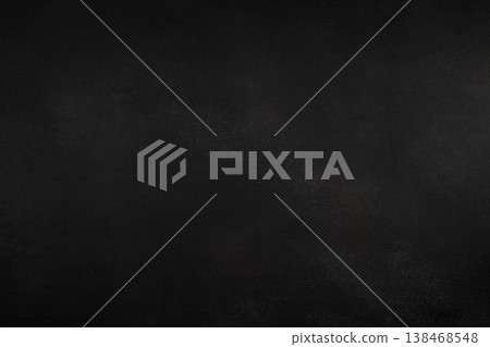 Dark textured black background with subtle powder dust, abstract food backdrop 138468548