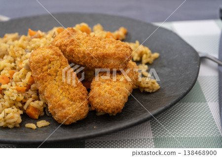 Turmeric Rice Bowl with Crunchy Fish Fingers Turmeric Rice Bowl with Crunchy Fish Fingers 138468900