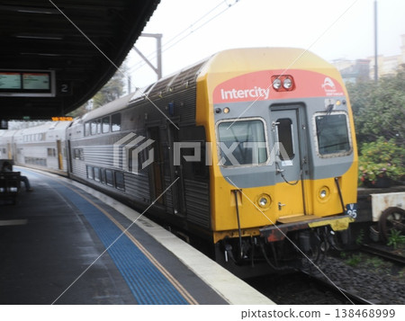 The Intercity V set stands quietly at the misty Katoomba station – a serene presence supporting the journey through the mountains. The Intercity V set stands quietly at the misty Katoomba station – a serene presence supporting the journey through the mountains. 138468999