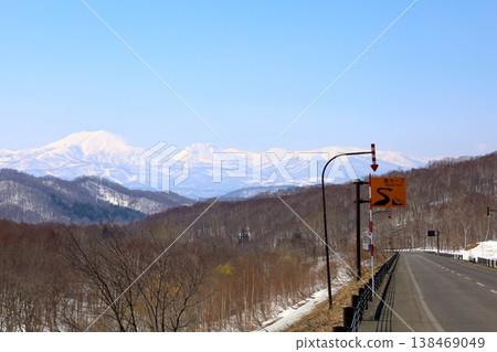 In early April, from Kutchan Town in Shiribeshi, Hokkaido, one can see Mount Yotei, also known as Ezo Fuji, and Niseko Annupuri, part of the Niseko mountain range, a mecca for skiing. 138469049