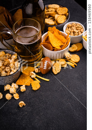Beer and different snacks for Superbowl or football party Beer and different snacks for Superbowl or football party 138469560