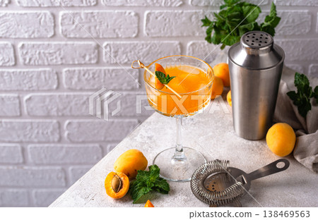 Fresh apricot Bellini cocktail with mint Fresh apricot Bellini cocktail with mint 138469563