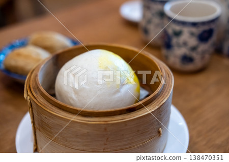 Steamed buns in a basket Steamed buns in a basket 138470351