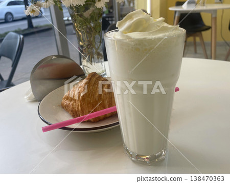 milk cocktail with croissant on the tabe in cafe milk cocktail with croissant on the tabe in cafe 138470363