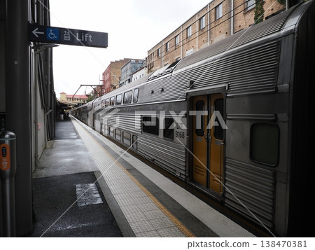 The Intercity V set stands quietly at Lithgow station – a scene at the entrance to a city where a journey over the mountains ends. The Intercity V set stands quietly at Lithgow station – a scene at the entrance to a city where a journey over the mountains ends. 138470381