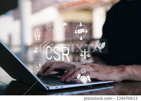 CSR Corporate Social Responsibility concept showing businessman hands typing on laptop with digital icons of ethics, sustainability, environment, and community engagement for business growth. ESG, CSR Corporate Social Responsibility concept showing businessman hands typing on laptop with digital icons of ethics, sustainability, environment, and community engagement for business growth. ESG, 138470613