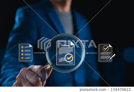 Document verification process and audit review concept. Magnifying glass inspecting approved paperwork in digital workflow, analyzing checklist, signed report for compliance control, quality assurance 138470622