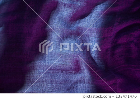 Colorful fabric with shadow patterns reflecting light in a studio setting during the day 138471470