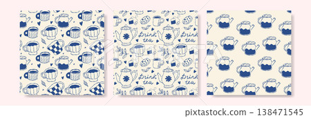 Vintage tea themed patterns with blue teapots and flowers on cream backgrounds Vintage tea themed patterns with blue teapots and flowers on cream backgrounds 138471545