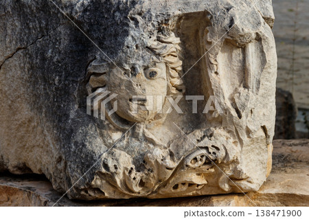 Stone faces in the ancient city of Myra in Demre, Antalya province in Turkey 138471900