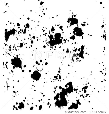 Black ink splatters dance across a stark white canvas 138472807