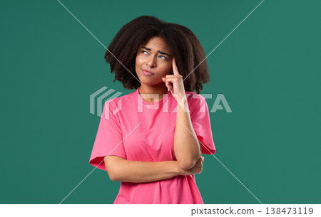 Thoughtful Around African Teen School Student Girl, Weighing Options, Dreaming Thoughtful Around African Teen School Student Girl, Weighing Options, Dreaming 138473119