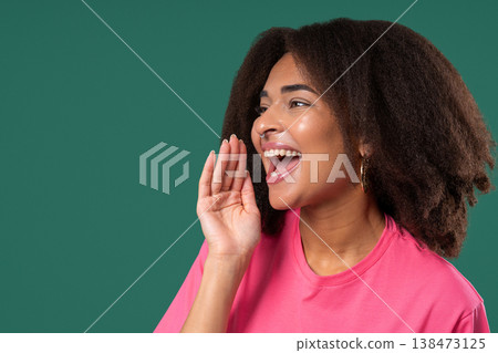 Attention, Portrait Of Young Woman Shouting, Holding Hand Near Open Mouth Attention, Portrait Of Young Woman Shouting, Holding Hand Near Open Mouth 138473125