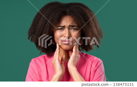 Young Teen Girl With Tooth Pain, green Background. Toothache, Dental Problem Young Teen Girl With Tooth Pain, green Background. Toothache, Dental Problem 138473131