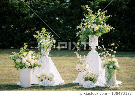 Sophisticated Pedestal Arrangements With Lush Floral Designs For Events Sophisticated Pedestal Arrangements With Lush Floral Designs For Events 138473182