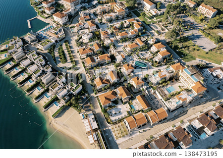 Panoramic Drone Shot Of Vibrant Coastal Community Atmosphere Panoramic Drone Shot Of Vibrant Coastal Community Atmosphere 138473195