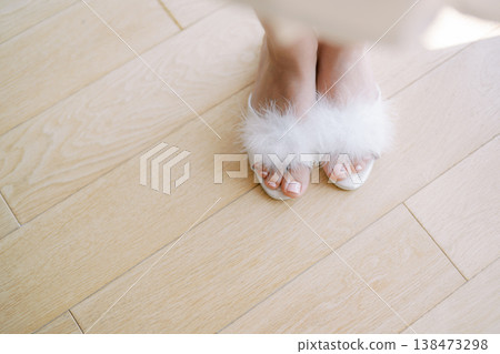 Soft Slippers Resting On Hardwood In Peaceful Bedroom Setting Soft Slippers Resting On Hardwood In Peaceful Bedroom Setting 138473298