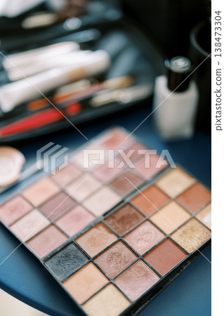 Neutral Eyeshadow Palette And Brushes On Vanity Beauty Tutorial Flatlay 138473304