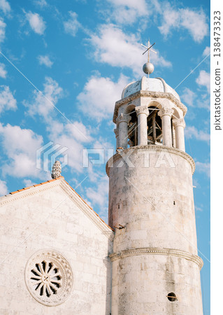 Bright Church Spire. Weathered Stone Steeple With Cross And Clouds 138473323