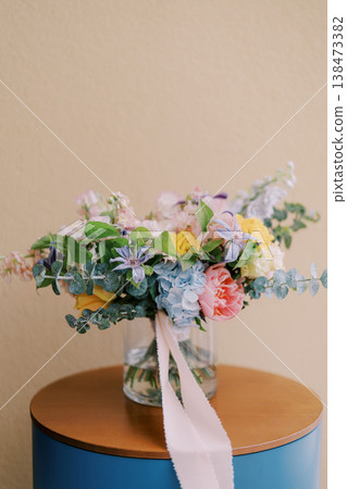 Delicate Pastel Roses And Peonies On Wooden Support With Ribbon Delicate Pastel Roses And Peonies On Wooden Support With Ribbon 138473382
