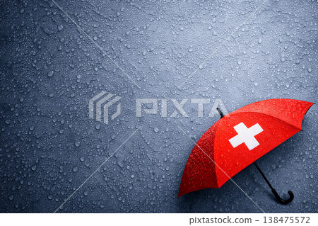 Red Umbrella With White Cross On Wet Surface Red Umbrella With White Cross On Wet Surface 138475572