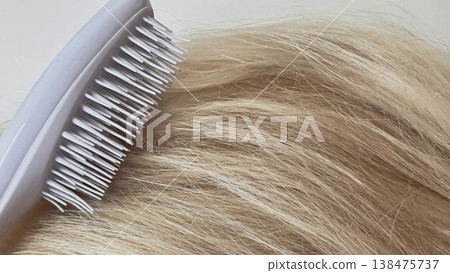 Blonde Hair Being Brushed 138475737