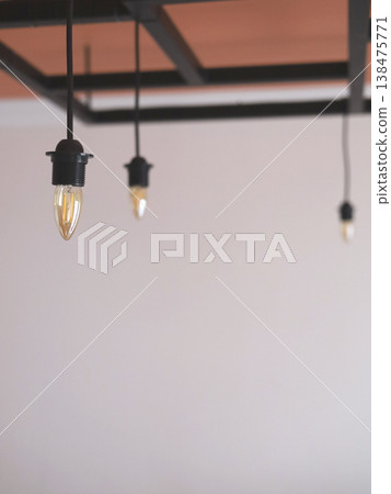 Warm Hanging Bulbs In Minimal Interior Space Warm Hanging Bulbs In Minimal Interior Space 138475771