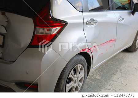 Car with Rear Side Damage and Red Scratch Car with Rear Side Damage and Red Scratch 138475775
