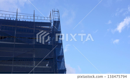 Midrise Building Facade Undergoing Exterior Renovation Midrise Building Facade Undergoing Exterior Renovation 138475794