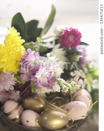 Spring Floral Basket With Painted Eggs Spring Floral Basket With Painted Eggs 138475813