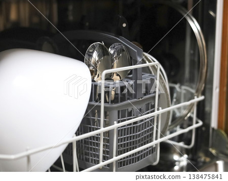 Loaded Dishwasher Interior with Clean Tableware 138475841
