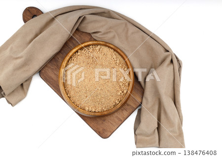 Organic Oleaster Seed Powder in a Rustic Wooden Bowl on a Clean White Background for Healthy Living 138476408