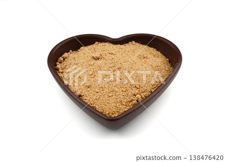 Nutritious Oleaster Seed Powder in Heart Shaped Wooden Bowl on White Background for Heart Health Nutritious Oleaster Seed Powder in Heart Shaped Wooden Bowl on White Background for Heart Health 138476420